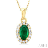 5x3 MM Oval Shape Emerald and 1/20 Ctw Single Cut Diamond Halo Precious Pendant with Chain in 14K Yellow Gold